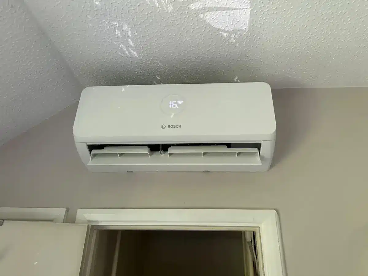 Bosch wall-mounted air conditioning unit above a doorway